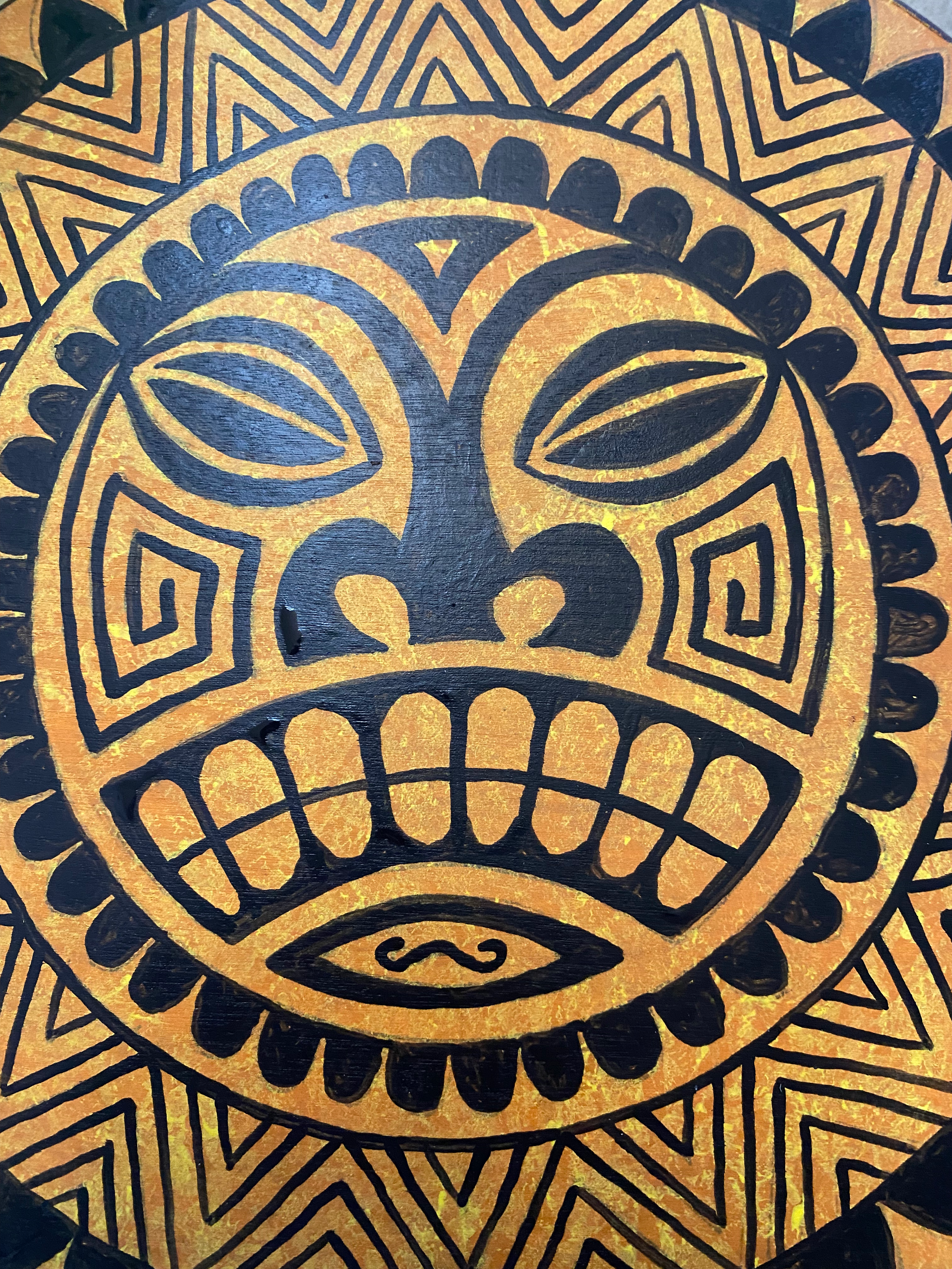 Sun god tiki inspired Banjo Ukulele built by Tiki King