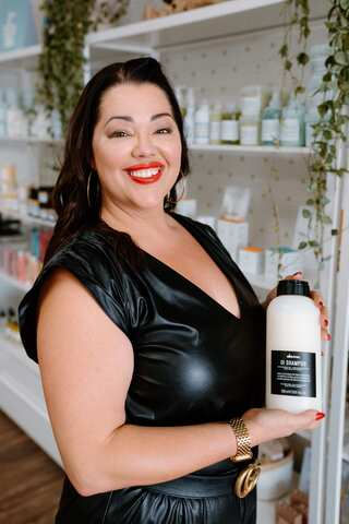 Davines product on hand at Certified Vixen, part of a moisture-first at-home routine
