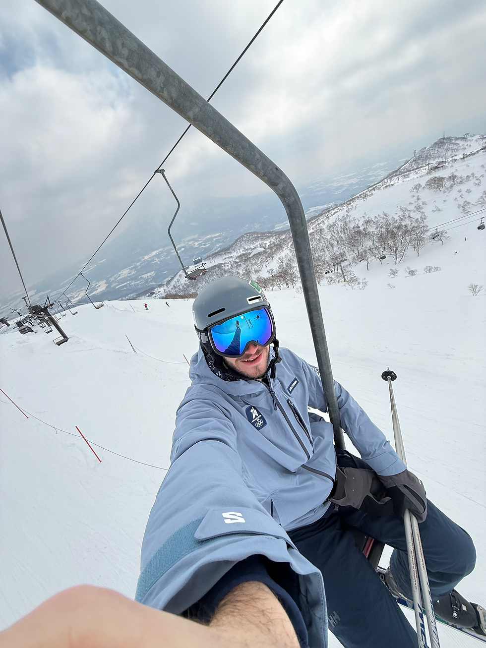 Author on the 'pizza box' chairlift: a legendary, single-seater chairlift with a seat roughly the size of a pizza box