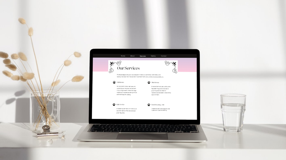 Laptop displaying the services page of The Canine House of Style website.