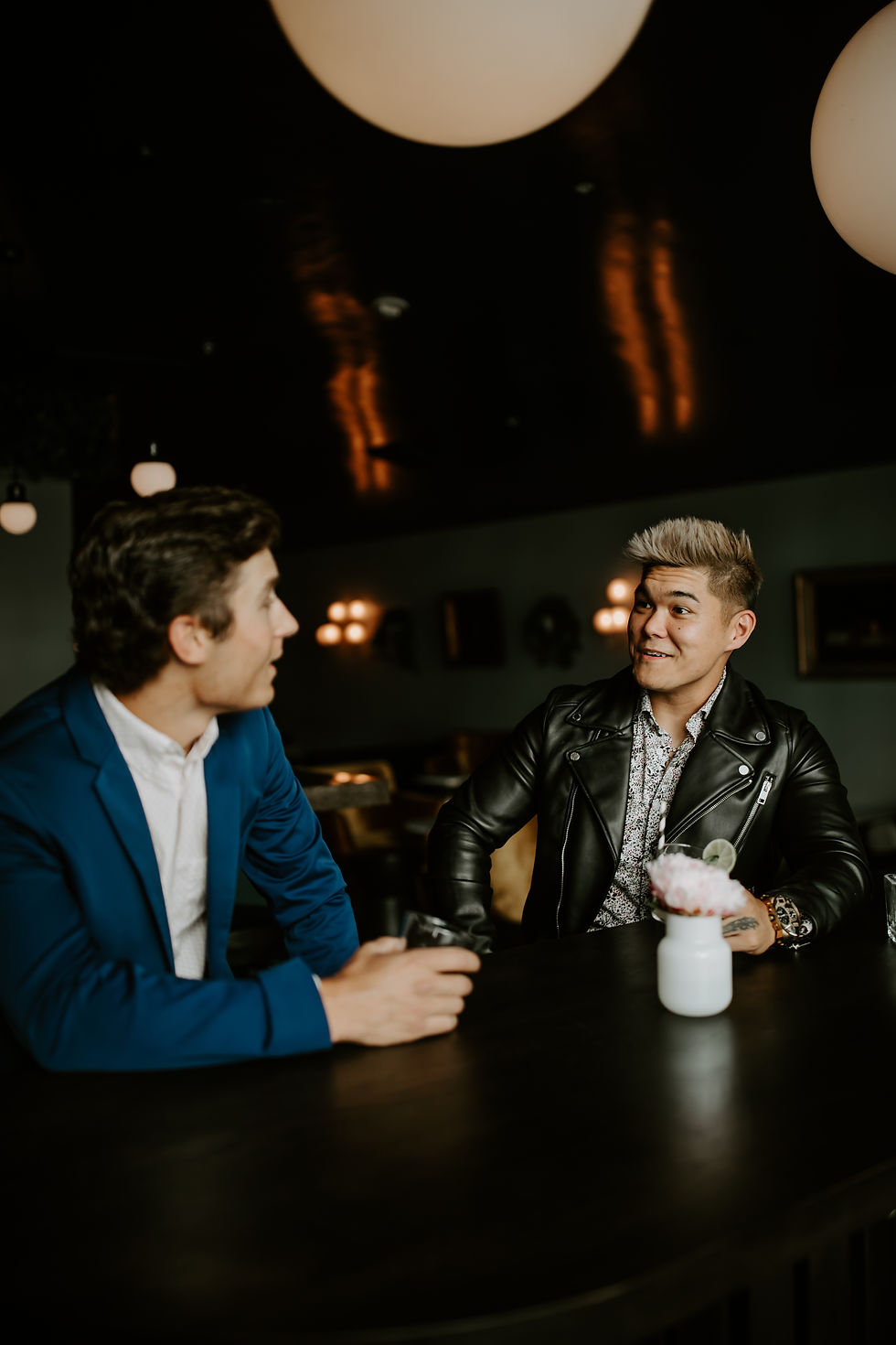 men in bar enjoying cocktails