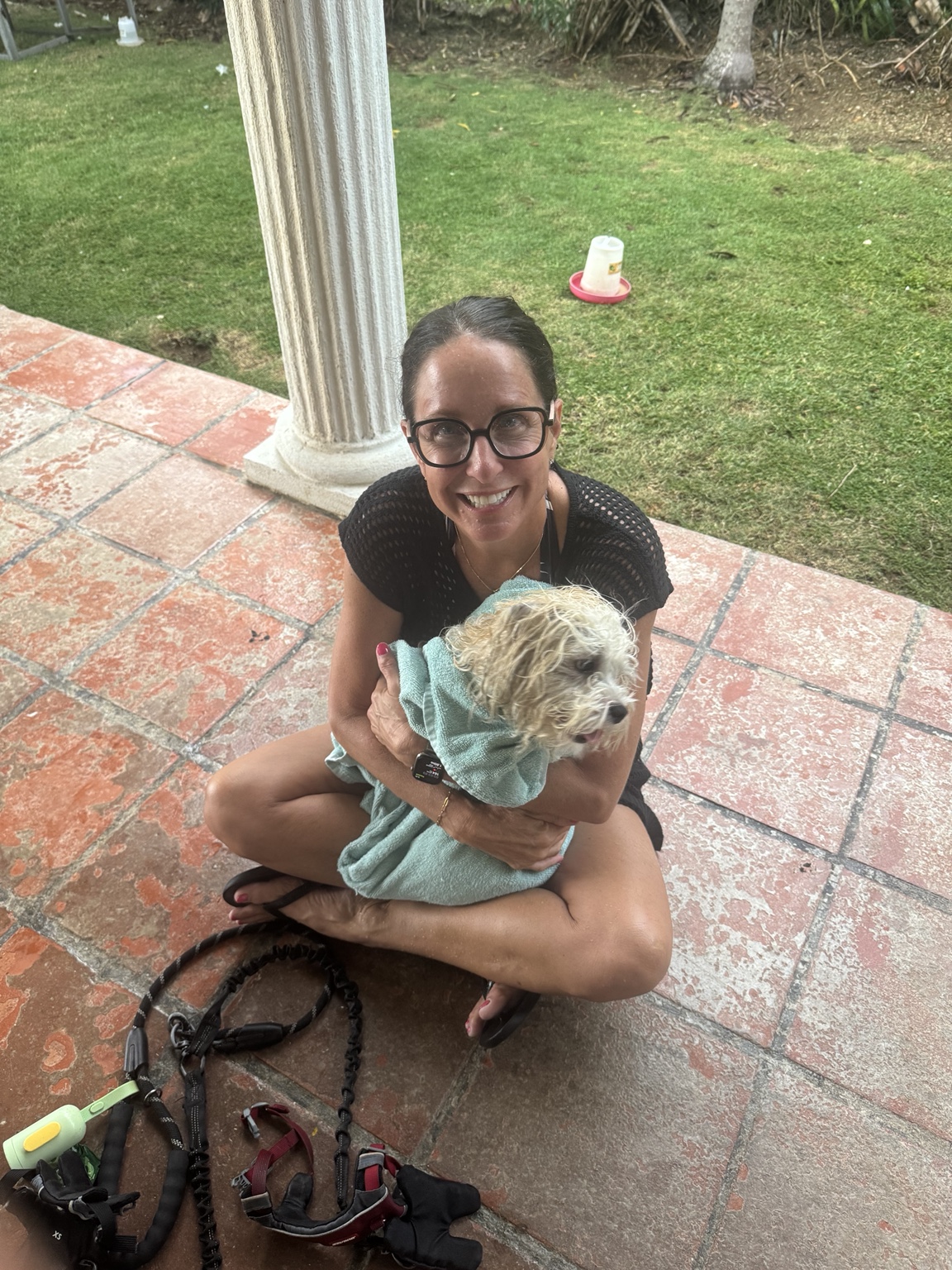 Pet sitter cuddling a dog