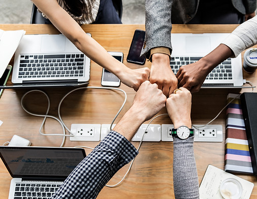 colleagues-giving-fist-bump.jpg