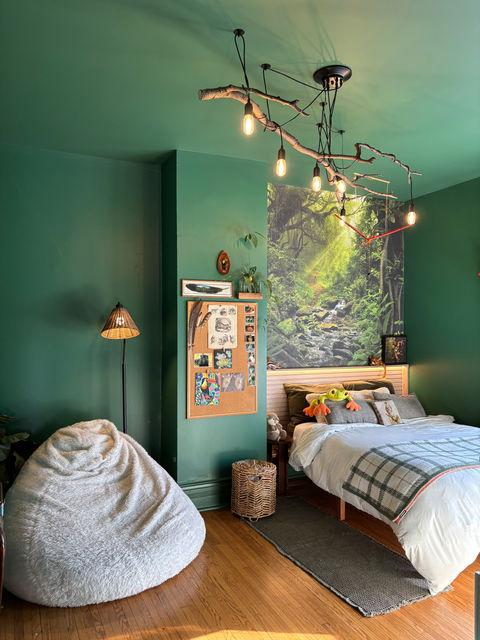 bedroom style using what homeowners already had and some paint and wallpaper.