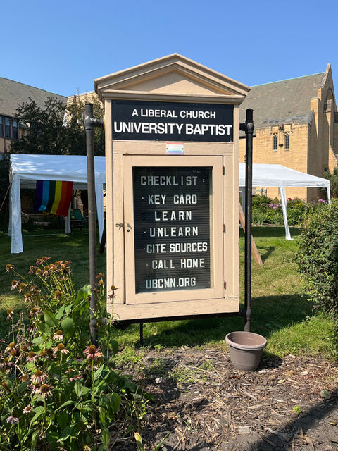 Sign that says: UBC: Checklist - key card, learn, unlearn, cite soyrces, call home. ubcmn.org