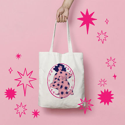 photo of canvas tote bag with campaign illustration printed on it. Bag is surrounded by illustrated stars and sparkles.