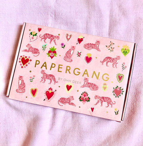 photo of pink rectangular box covered with illustrations of pink and red tigers, hearts and flowers.