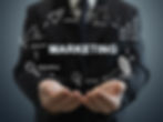 Business person holding a marketing strategy overview
