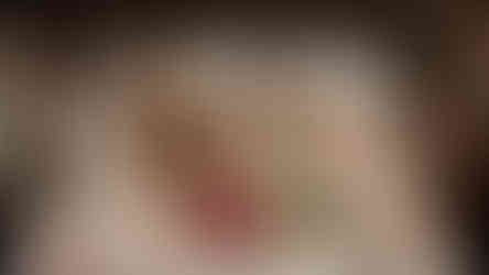 proud sisters holding their newest addition