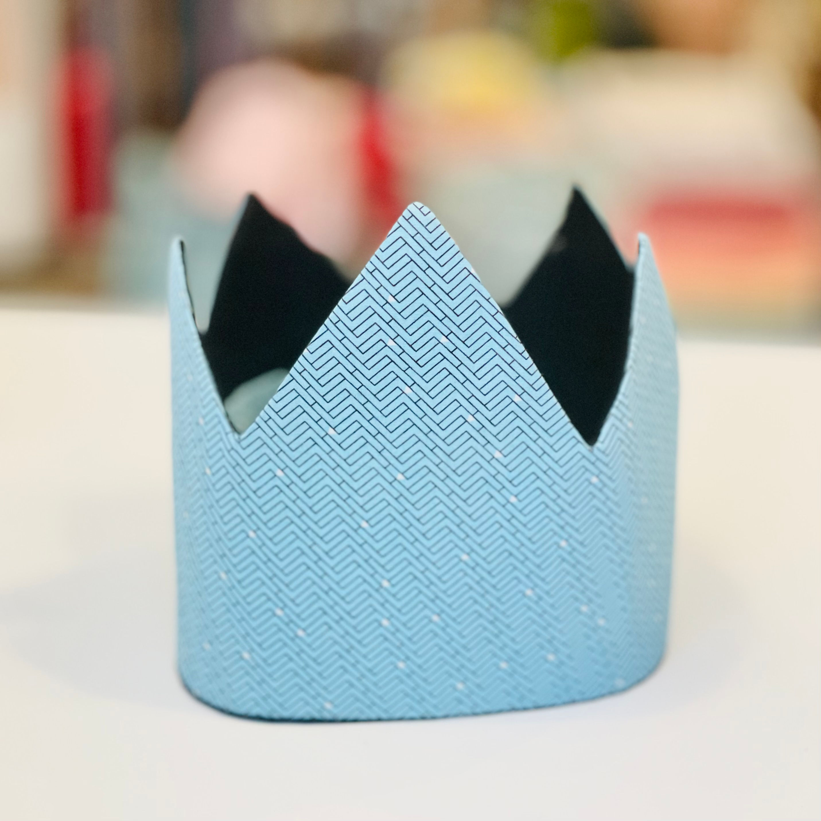 kroon met button - blauw