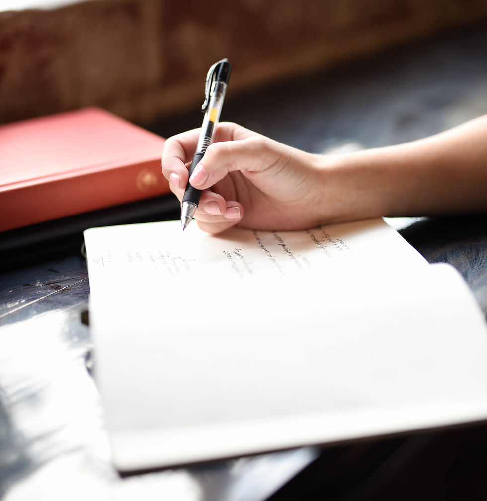 Writing down notes for your missing pet. Writing down where they were last seen and when.