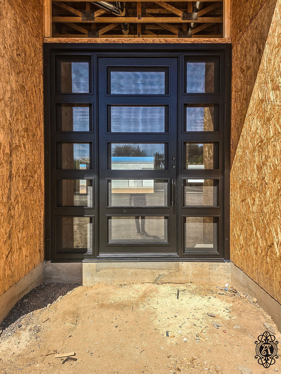 A custom iron entry door from Allied Iron on a new build.