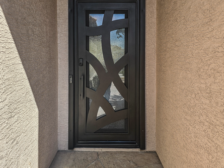 A custom iron entry door.