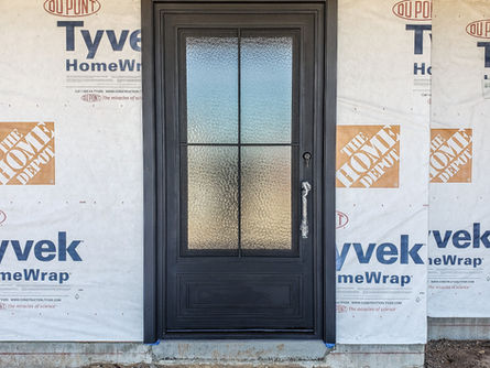 A custom iron entry door for a new build home.