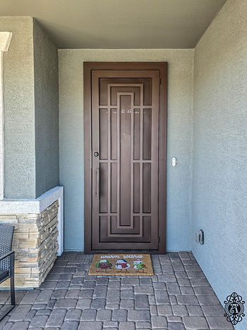 Custom iron security doors by Allied Iron enhancing home security and curb appeal.