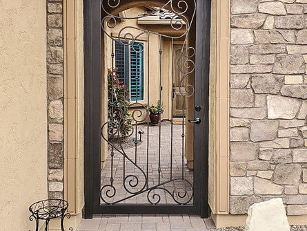 Custom iron courtyard enclosure installed at a Phoenix Arizona home by Allied Iron
