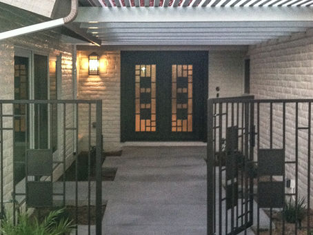 A custom entry door with matching enclosure.