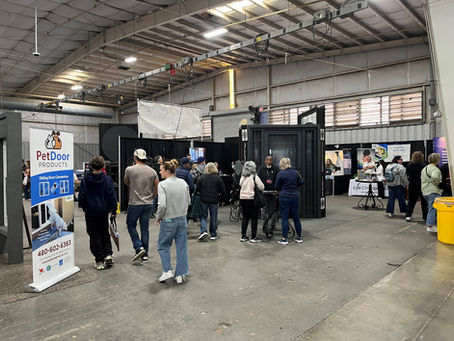 One of Allied Iron's friendly staff discussing iron options with a potential client at the Maricopa County Home & Landscape 