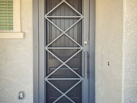 A custom iron security door fabricated & installed by Allied Iron.