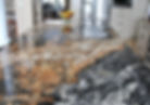 amore di noce granite countertop with rich brown gold and black tones in elegant kitchen