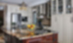 amore di noce granite kitchen island featuring bold veining warm neutral tones and classic cabinetry