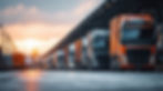 commercial-trucks-lined-up-logistics-hub-sunset.jpg