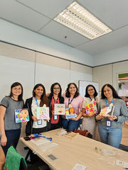 Six women display artwork, a creative spark for your team.
