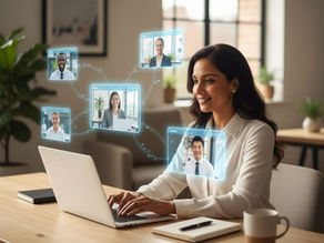 smiling woman at a laptop in a cozy office, engaging in a virtual meeting with four floating screens of diverse colleagues. the atmosphere is collaborative for virtual staffing for small businesses.