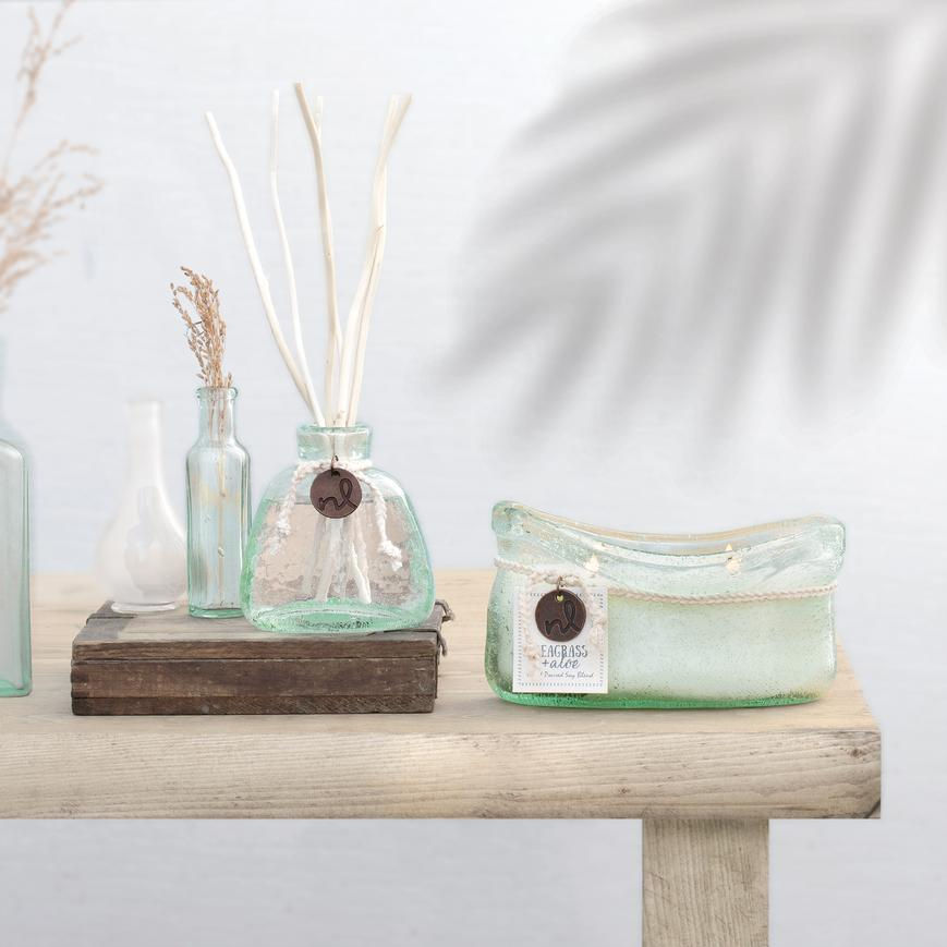 Miniatura: Windward home fragrance collection available as reed diffusers or scented candles in recycled glass vessels