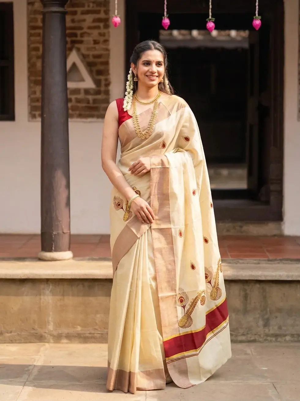 Maroon Feather Veena Tissue Kasavu Saree Front View