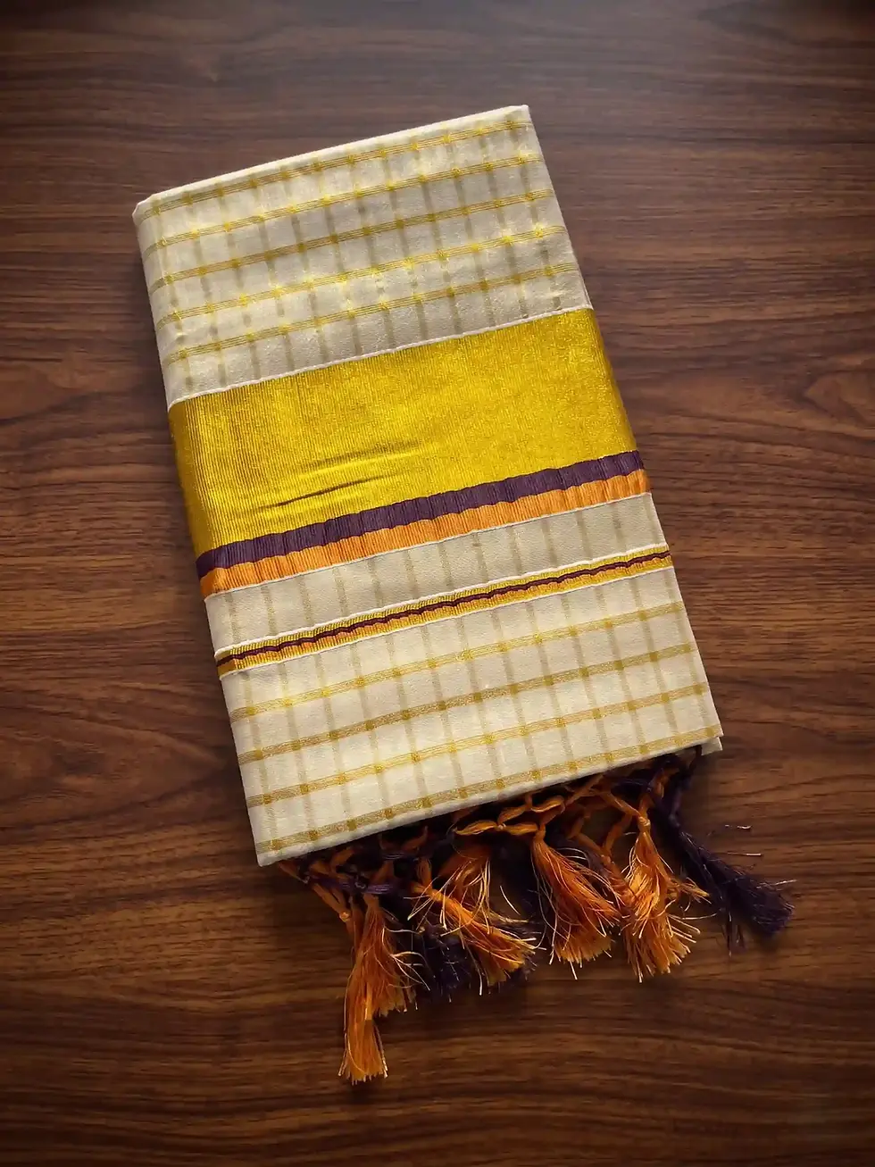Thumbnail: Coffee Bean & Orange Golden Block Kasavu Tussel Tissue Saree Fold View