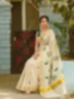 Green Leaf Embroidery Tissue Kasavu Saree Sitting View