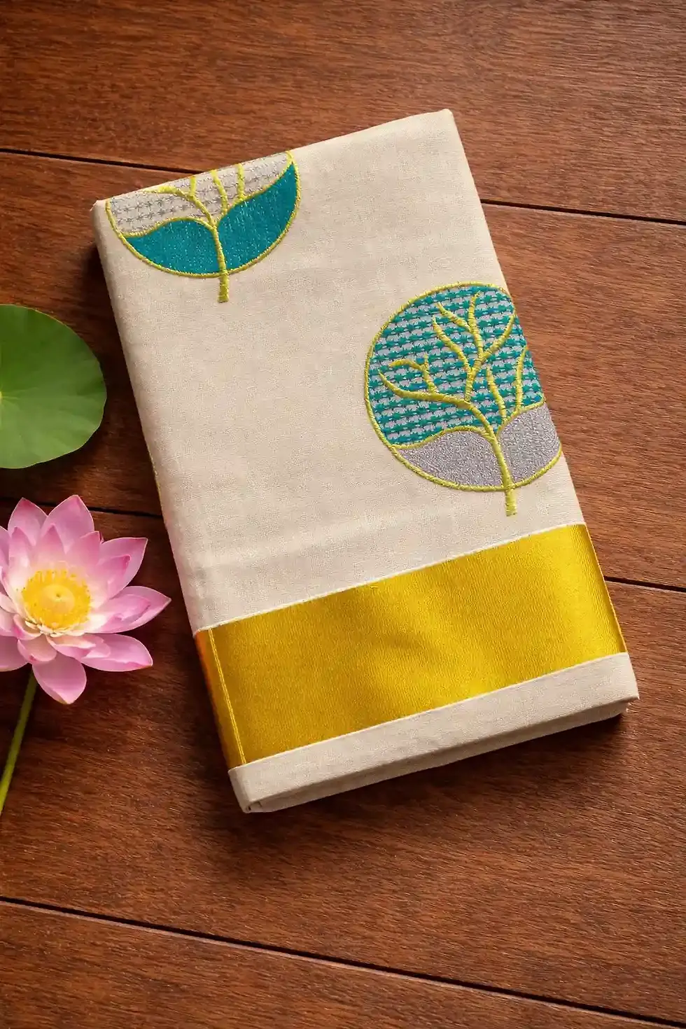 Thumbnail: Green Leaf Embroidery Tissue Kasavu Saree Fold View