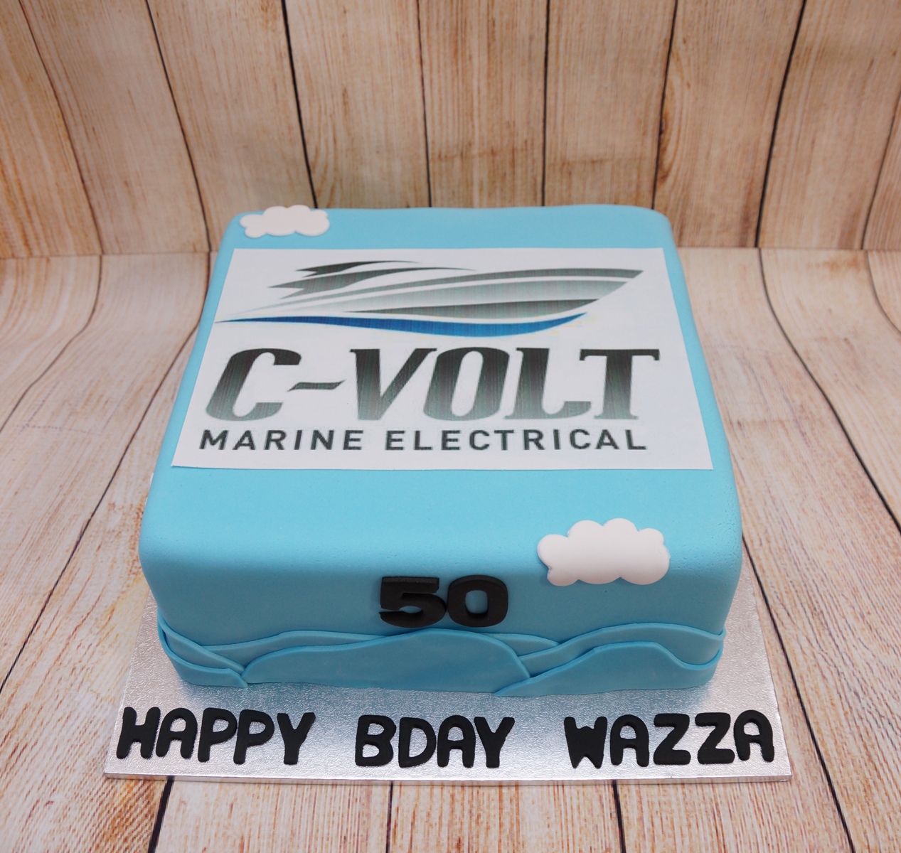 Blue CVolt Boat Cake
