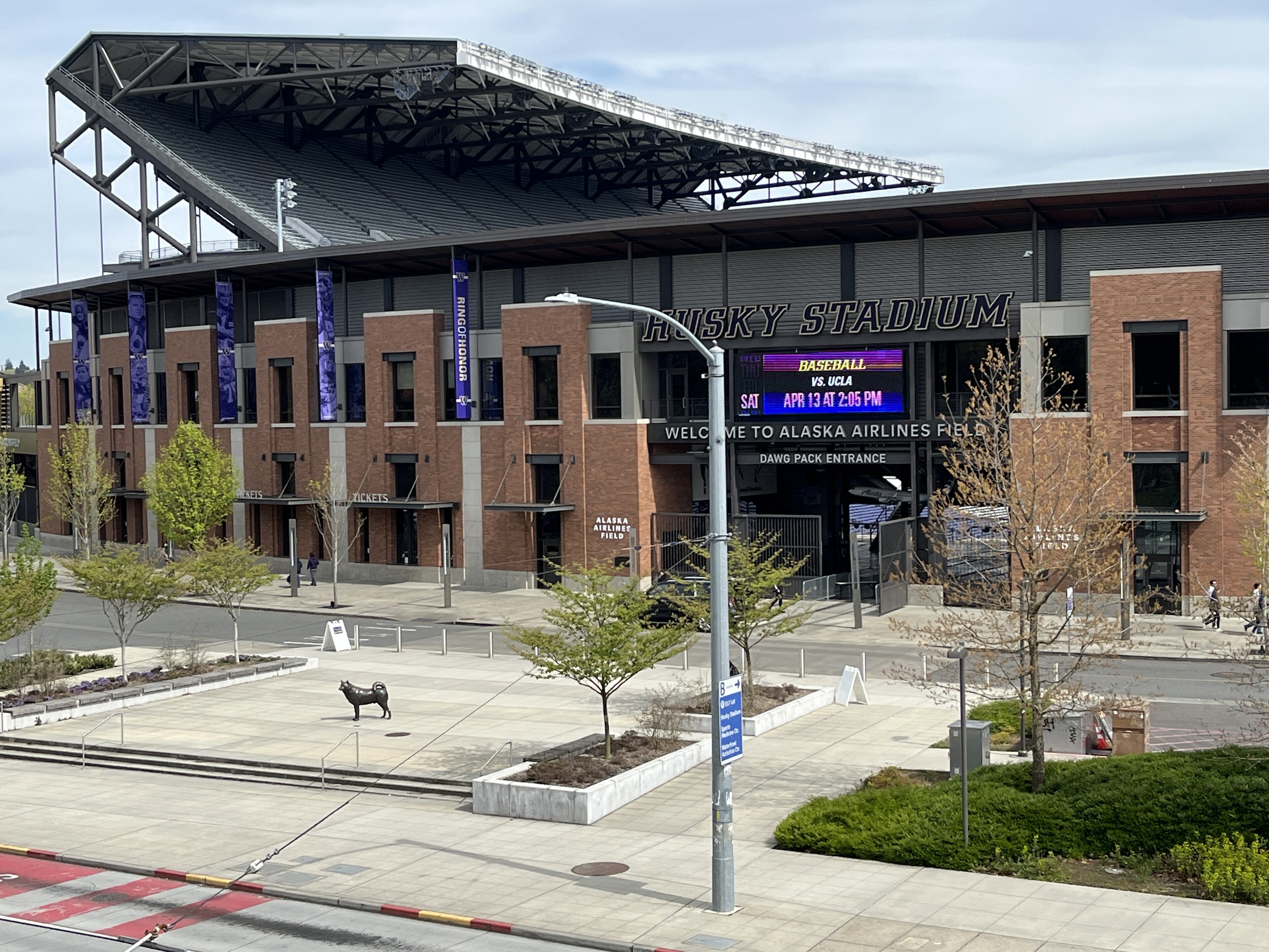 <h2>The Same Doctors Who Treat the Huskies See Anyone</h2>
<p>Dr. Kimberly Harmon has been the University of Washington football team's head physician since 1998, treating the athletes who fill Husky Stadium every fall Saturday. Her average patient is not a linebacker. "The average age of my patient is actually 49," she told KOMO News. "What we try to do is get them back to what they like to do, whether that's golf or tennis or horseback riding." Harmon works out of the UW Medicine Sports Medicine Center, a 30,000-square-foot clinic at the south end of Husky Stadium, 3800 Montlake Blvd NE. Her patient list backs up a claim the center makes on its own team-care page: the public gets the same expert care the athletes do.</p>
<h2>From Scattered Clinics to One Room at Husky Stadium</h2>
<p>That single address is recent. Before 2013, UW Medicine's sports medicine clinic sat beside Edmundson Pavilion, one stop in a practice that Dr. Stanley Herring, medical director of UW Medicine Sports, Spine and Orthopaedic Health, said was practiced piecemeal across UW Medicine's buildings. Bringing it into one coordinated, one-stop location, he said, was too good an opportunity to pass up. Construction on the Husky Stadium south-end project began in late 2010, and when the space was finally ready, the whole practice moved in three days. The center opened to the public that September, with a ribbon cutting on September 9, 2013.</p>
<h2>A Roster That Covers More Than Football</h2>
<p>The physicians there are not just football. Dr. John O'Kane has been head team physician since 1996. Dr. Jonathan Drezner directs UW's Center for Sports Cardiology and covers men's basketball and track. Dr. Ashwin Rao covers baseball and crew. Dr. Hank Pelto covers men's soccer and women's basketball. Between them, the center covers Husky programs most Seattle fans would not think to name: women's soccer, gymnastics, volleyball, softball, tennis, golf, cross country, swimming, crew.</p>
<h2>Open to Hikers, Gardeners and Weekend Golfers</h2>
<p>Dr. Mark Harrast, the center's medical director when it opened, put the invitation plainly: "Anyone with activity-related pain, be it from hiking, gardening, golf, or running a marathon, is welcome to see us." That is not marketing gloss. It shows up in Harmon's own patient list, where the goal is rarely a return to the field and usually a return to the driving range or the trail. The center's own team-care page describes its patients today in the same terms: the weekend basketball player, the recreational skier, the professional athlete on the roster next door, all listed side by side.</p>
<h2>Booking Means a Phone Call, Not a Walk-In</h2>
<p>New patients cannot book online. UW Medicine requires a call to 206-598-3294, option 8, to get on the schedule, and MyChart self-scheduling only opens up for returning patients seen there within the last three years. It is a phone line, not an open door, but anyone can dial it, whether the caller played linebacker for the Huskies or tweaked a knee on a Saturday hike. The same practice also runs clinics in Ballard and at the Northwest Outpatient Medical Center, but the flagship stays under the stadium, in the building the football team and the general public share. That same number rings whether the caller wants a second opinion on a sore shoulder or a first appointment.</p>
<h2>One Building, One Standard of Care</h2>
<p>Nobody calling that number gets sorted into a lesser waiting room. They get an appointment with physicians whose other patients might be starting on Saturday, and the same standard of care. Harmon did not build her patient list around chasing a September opener. She built it, one 49-year-old at a time, around whoever calls the number the team does. The room under the stadium was built for the Huskies, but the phone line into it takes any caller who dials.</p>
