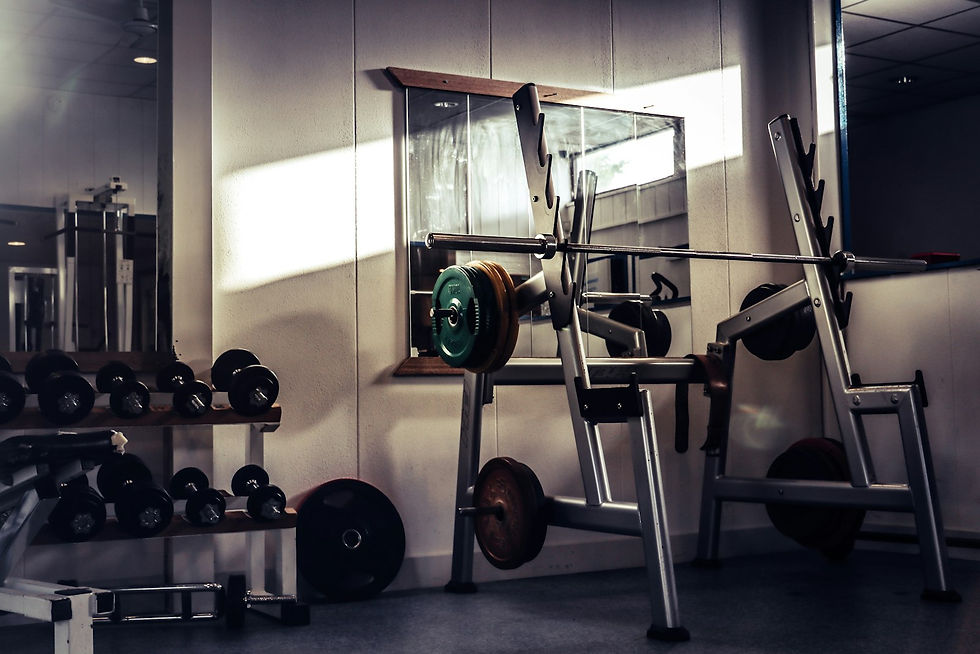Industrial warehouse gym floor with barbells and lifting platforms in Seattle's Georgetown and SODO district