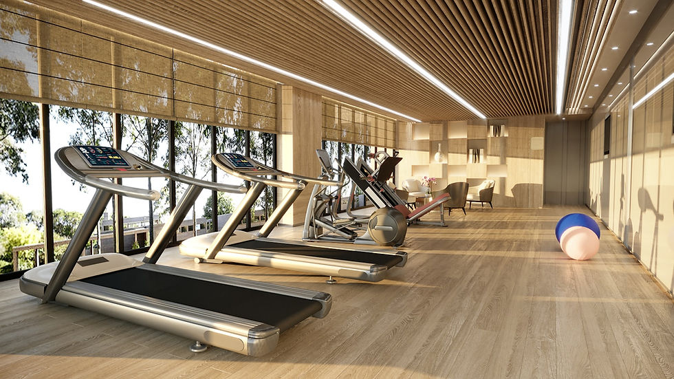 Weight room inside a Capitol Hill Seattle gym, free weights and racks lined up near tall street-facing windows