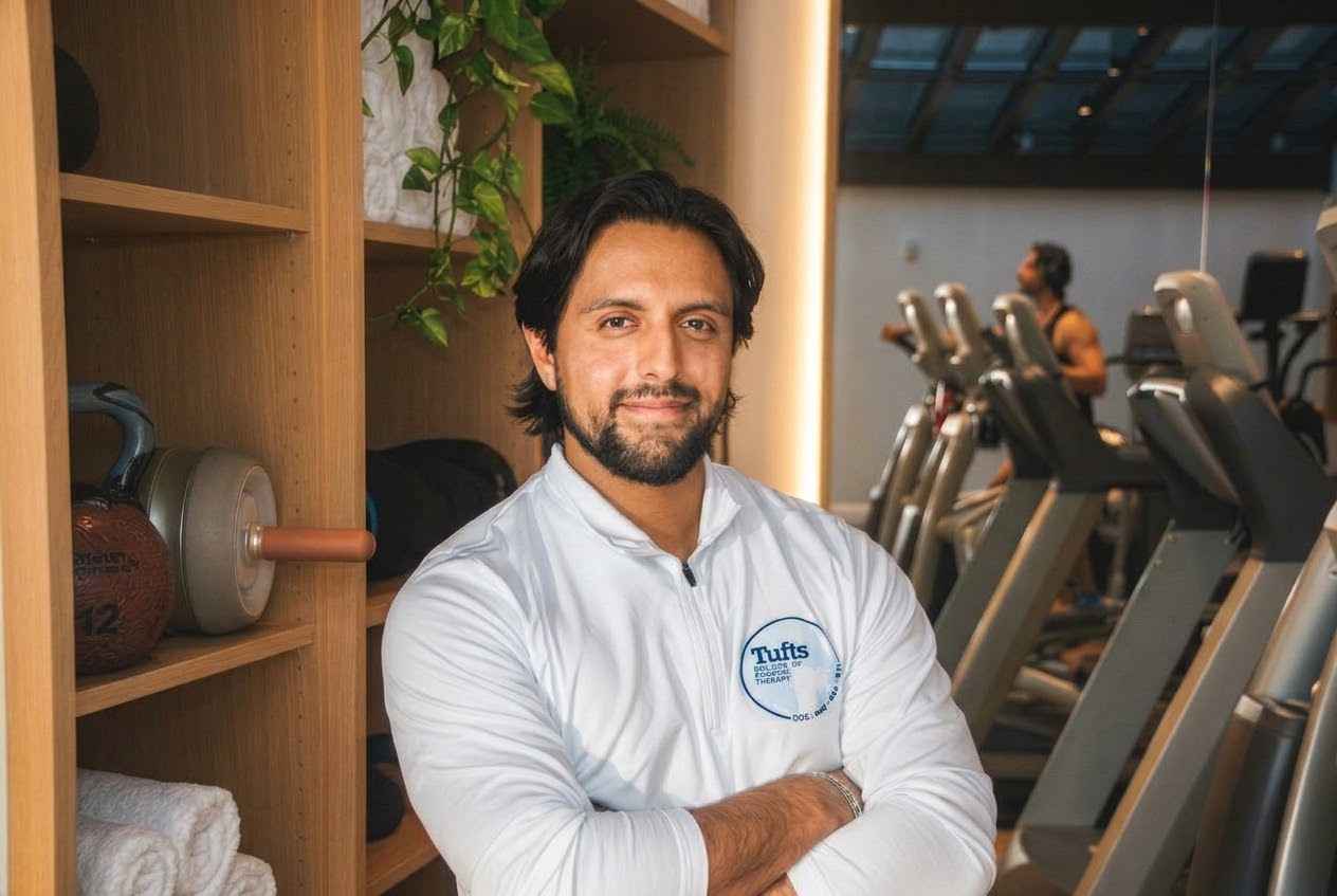 Juan Pablo Perez, arms crossed, in the gym