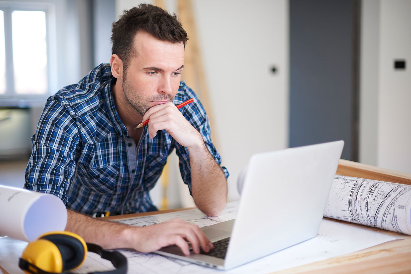 worker-using-laptop-office.jpg