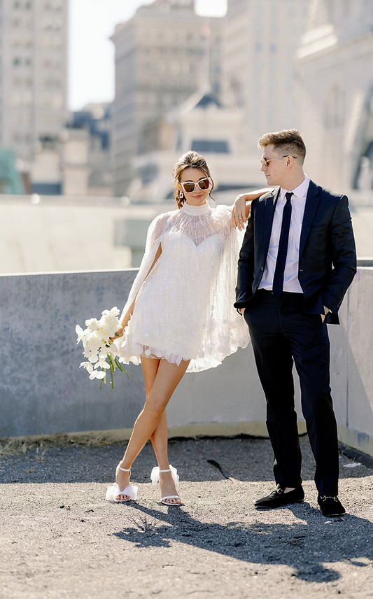 bride and groom on rooftop in philadelphia
