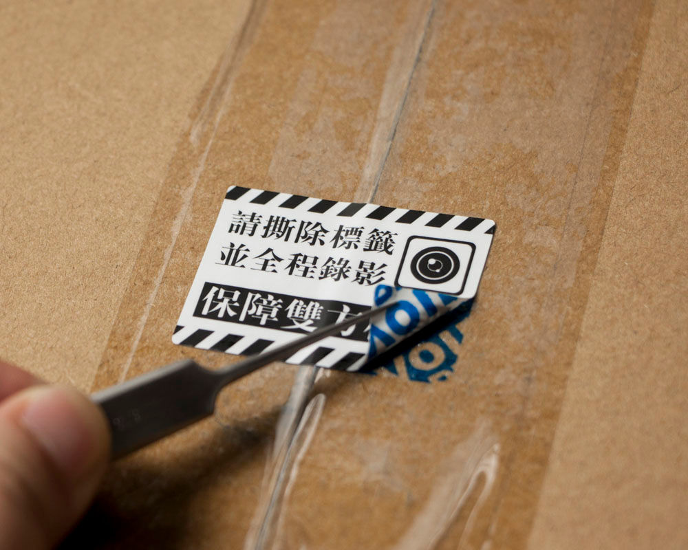 "record unpacking video" tamper-evident label
