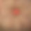 Thumbnail: Round orange ruffle cushion button detail