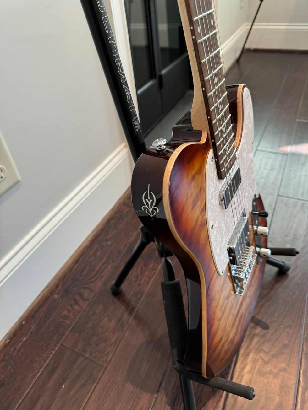 Sunburst Telecaster guitar on stand