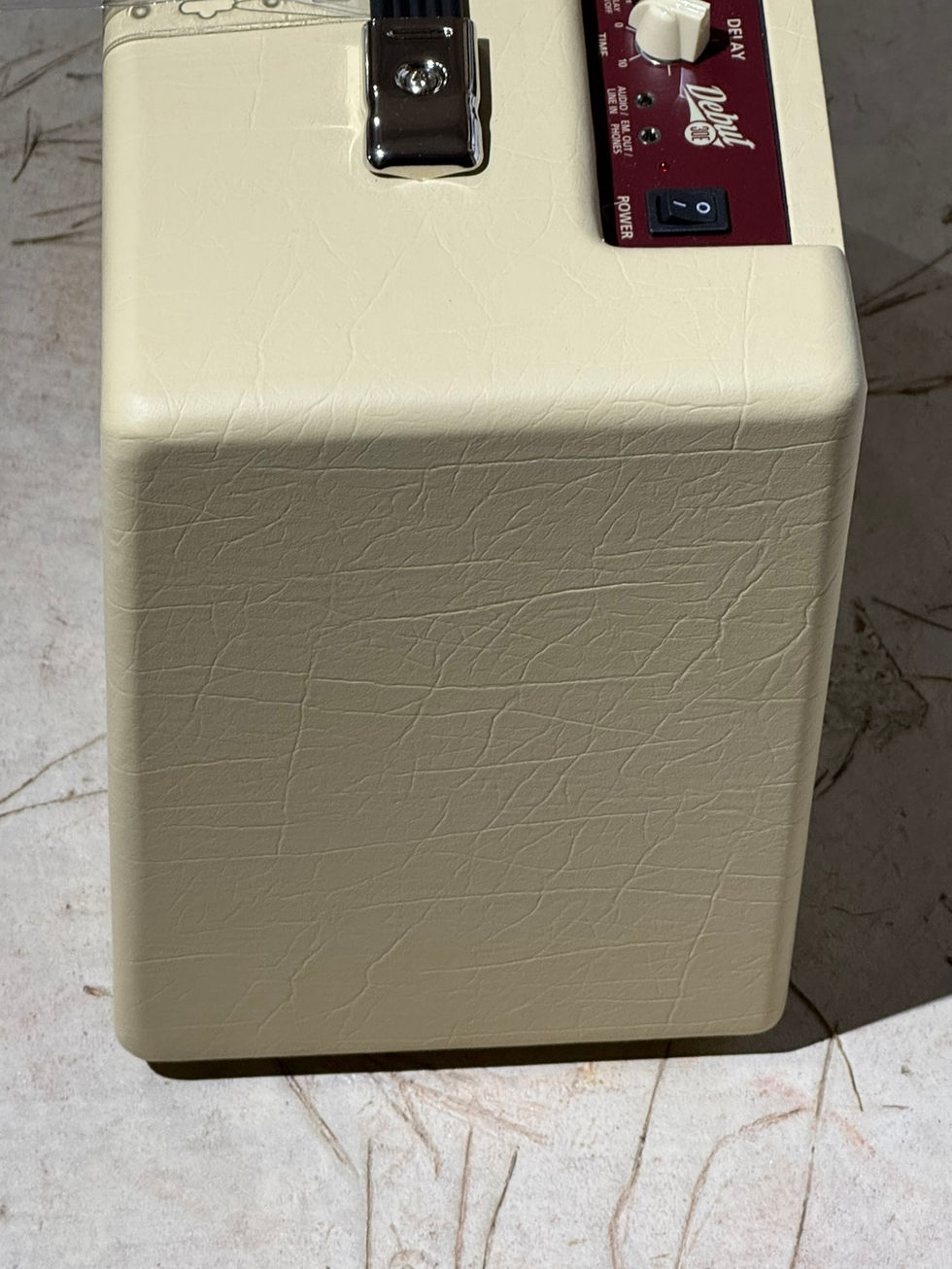 Cream-colored vintage amplifier