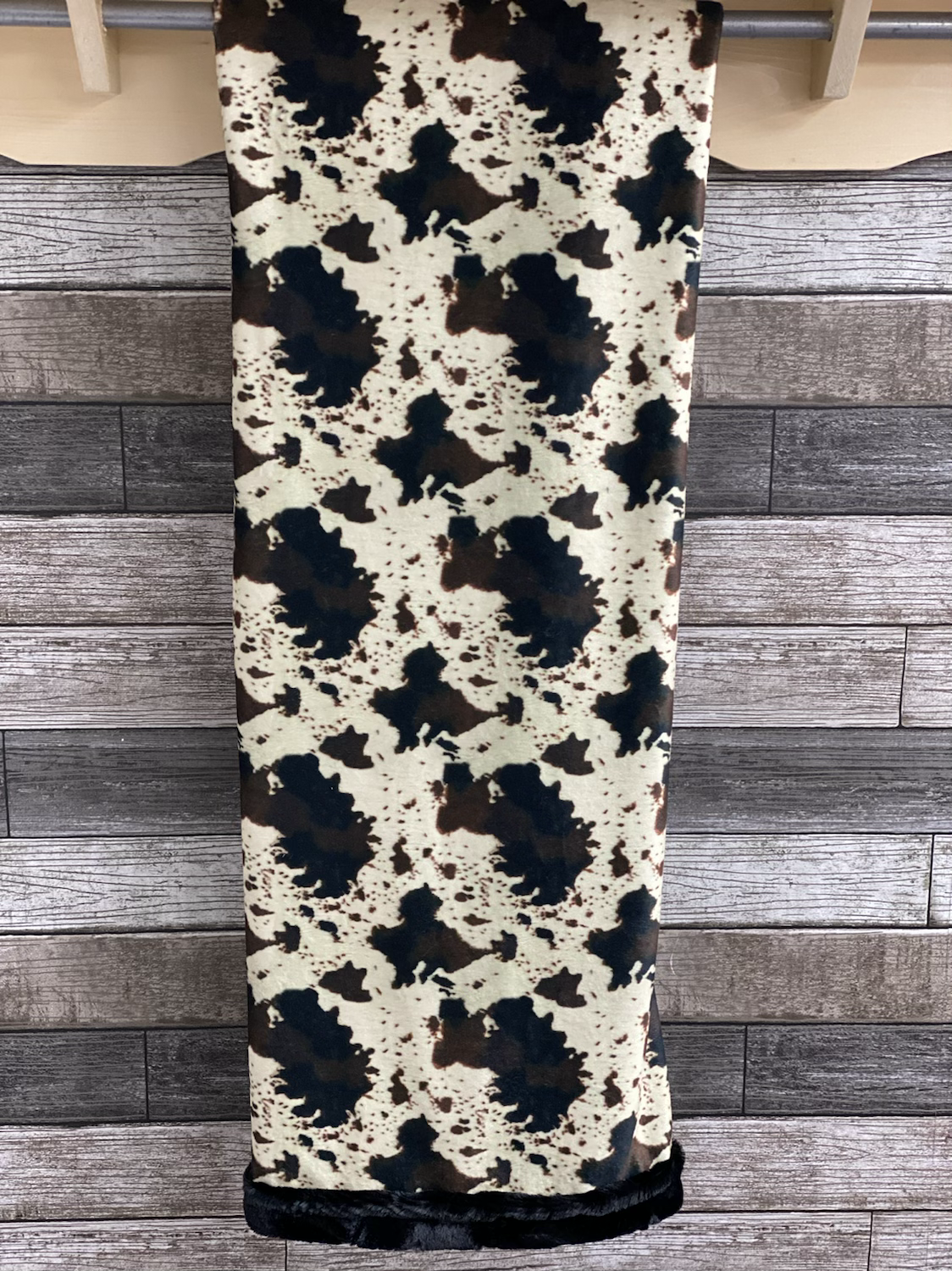 Cow hide with black backing