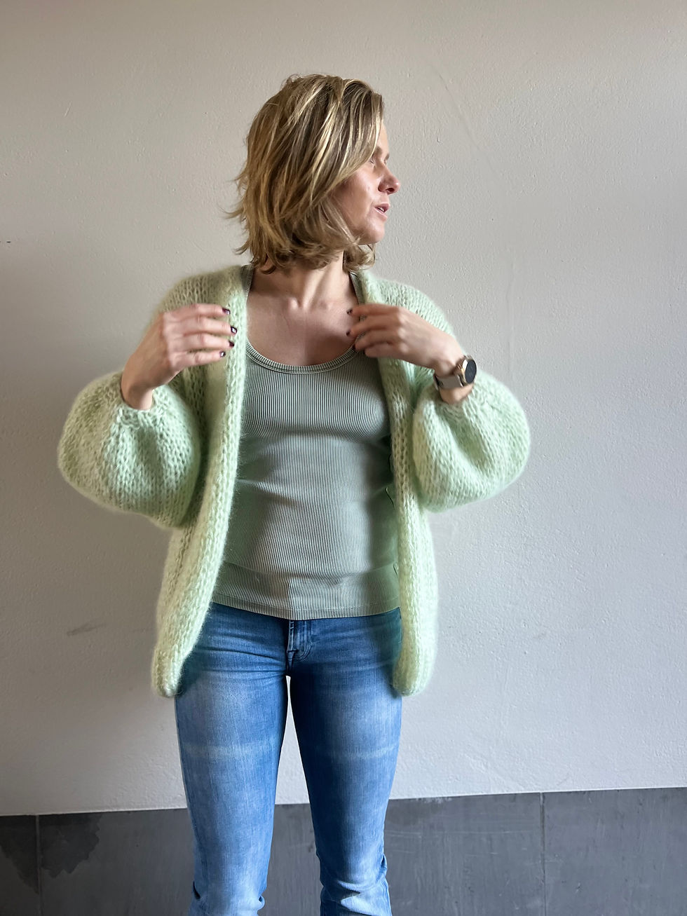 Half lange pastelgroene vest