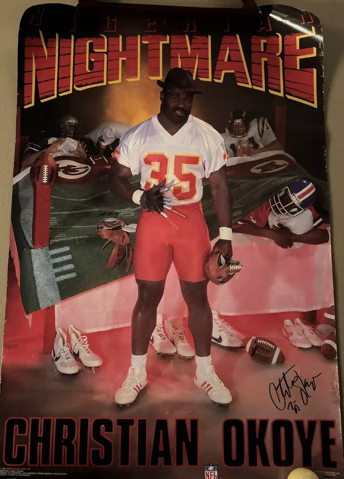 Poster of Christian Okoye, Kansas City Chiefs running back, in uniform, highlighting his nickname 'The Nigerian Nightmare' and his imposing athletic presence.