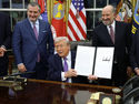 White House Backs Voluntary AI Safeguards as Debate Over Regulation Intensifies