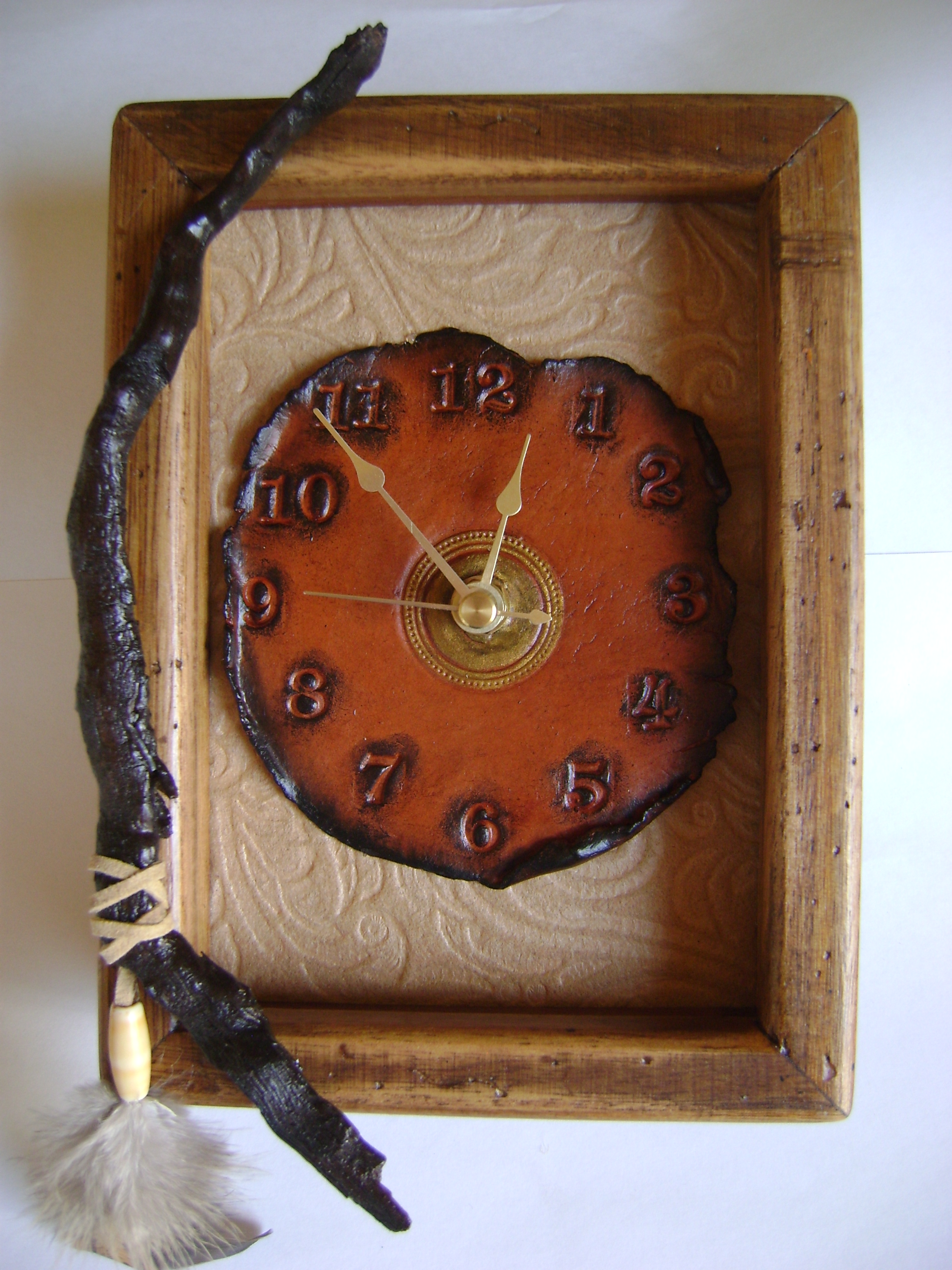 #176-Clock with stick & feathers