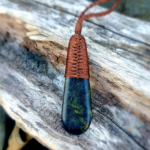 Douglas Creek Pounamu pendant with brown string, made by precious stone pendants